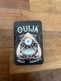 a sticker with the words ojua on it